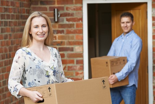 Experienced moving team handling furniture with care